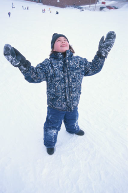 girl standing in snow
