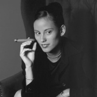 woman holding cigar
