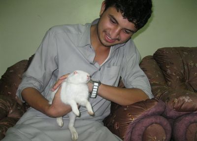 shafi holding a rabbit